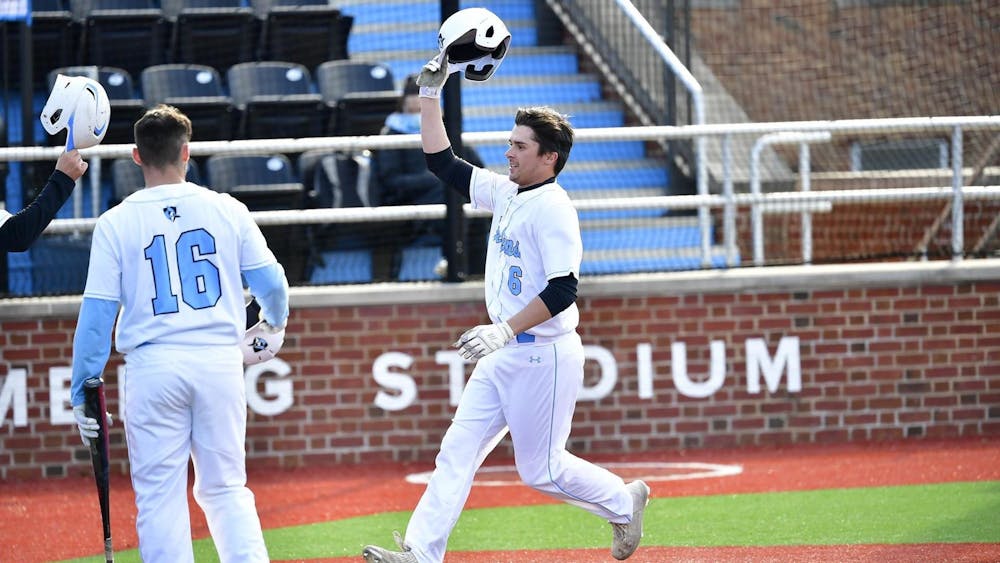 COURTESY OF HOPKINSSPORTS.COM
Senior Mark Lopez hit a grand slam in the first game to lift the Jays to a 6-3 win.