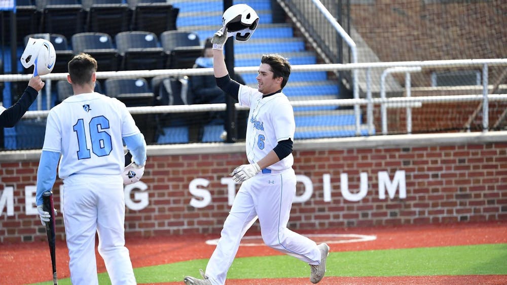 COURTESY OF HOPKINSSPORTS.COM
Senior Mark Lopez hit a grand slam in the first game to lift the Jays to a 6-3 win.