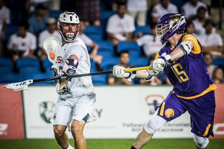 COURTESY OF JAKE FOX
Jake Fox (right) playing on the Iroquois Nationals at the 2018 FIL World Championship.