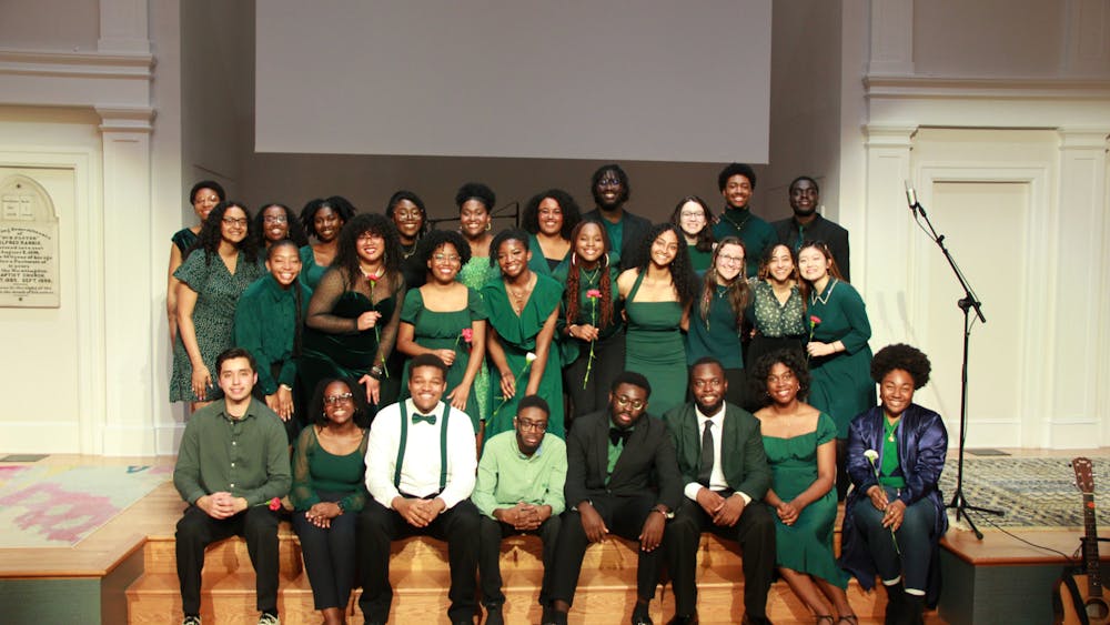 COURTESY OF KATIE BOMHOFF
Members of the JHU Gospel Choir pose for a picture after their latest spring performance at St. Moses Church.