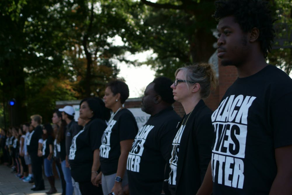  COURTESY OF KUNIL MAITI
 Around 400 members of the Hopkins community demonstrated in support of Black Lives Matter last Friday.