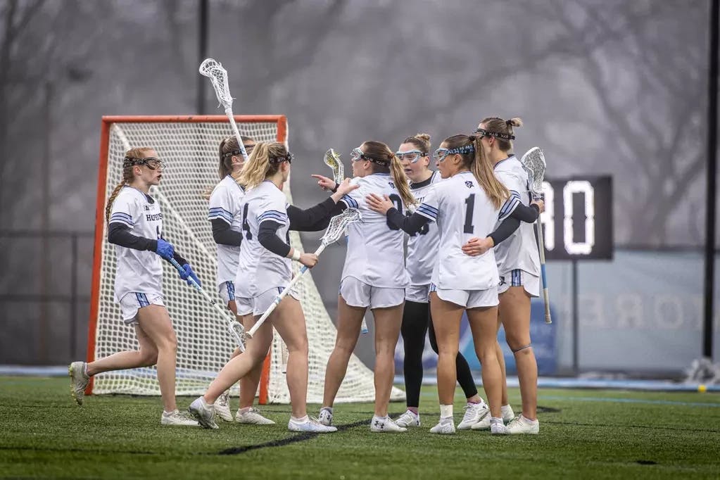COURTESY OF HOPKINSSPORTS.COM
Hopkins’ women’s lacrosse team returned to Homewood field this week to shut down opponents, while the track and field teams traveled to an indoor championship.