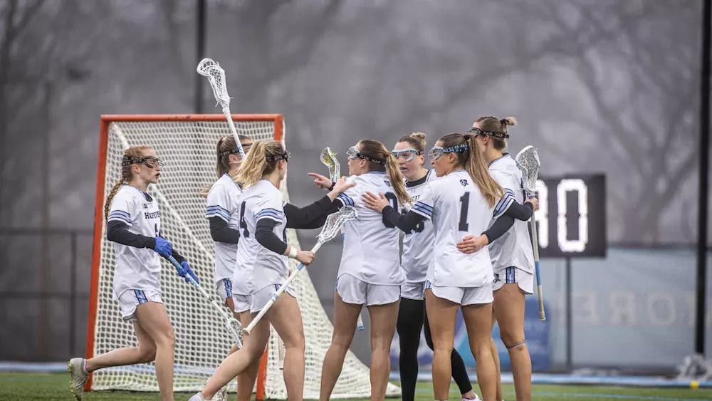 COURTESY OF HOPKINSSPORTS.COM
Hopkins’ women’s lacrosse team returned to Homewood field this week to shut down opponents, while the track and field teams traveled to an indoor championship.