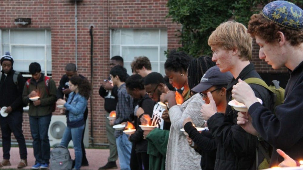 COURTESY OF EDA INCEKARA
Black students and allies gather to remember victims of police brutality.