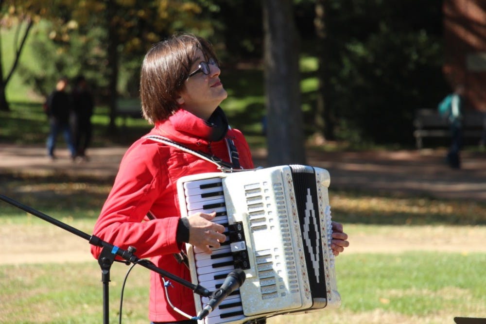 LEON SANTHAKUMAR / Photography Editor
 Yellow Barn accordionist Merima Ključo performed on a quad. 