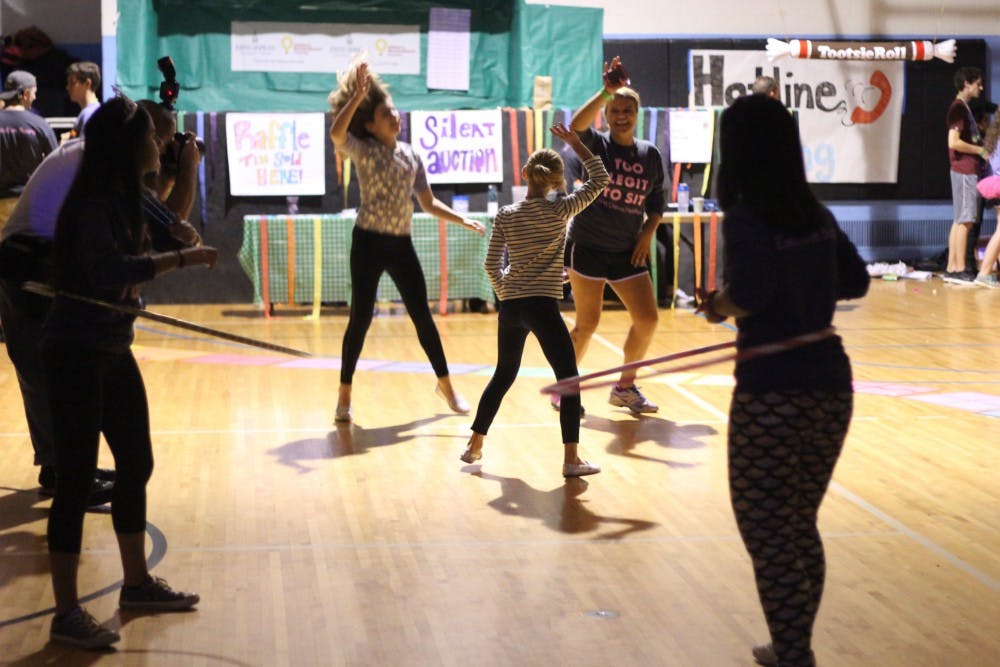 COURTESY OF HEIDI WOLL
The evening’s activities included dancing, jumping in a bounce house and listening to Miracle Minutes.