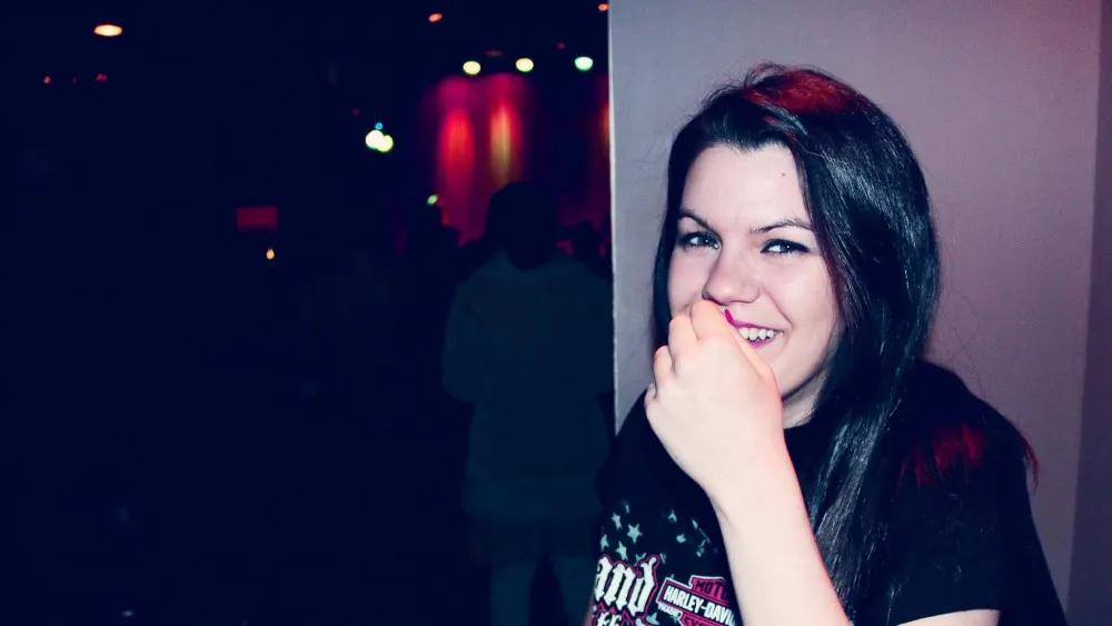 COURTESY OF MIA CAPOBIANCO
Jane Morris at Metro Gallery in Station North, whiskey sour in hand.