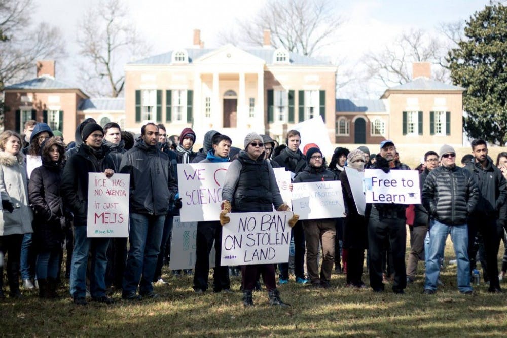  COURTESY OF JOHNS HOPKINS PHOTOGRAPHY FORUM
Members of the Hopkins community gathered in freezing weather to express solidarity with those stranded by Trump’s executive order.