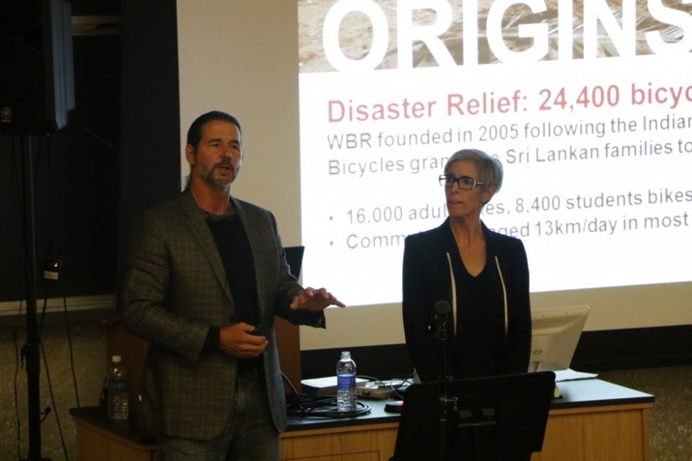  LEON SANTHAKUMAR/PHOTOGRAPHY EDITOR
Leah and F.K. Day discussed poverty relief through bicycle donations.