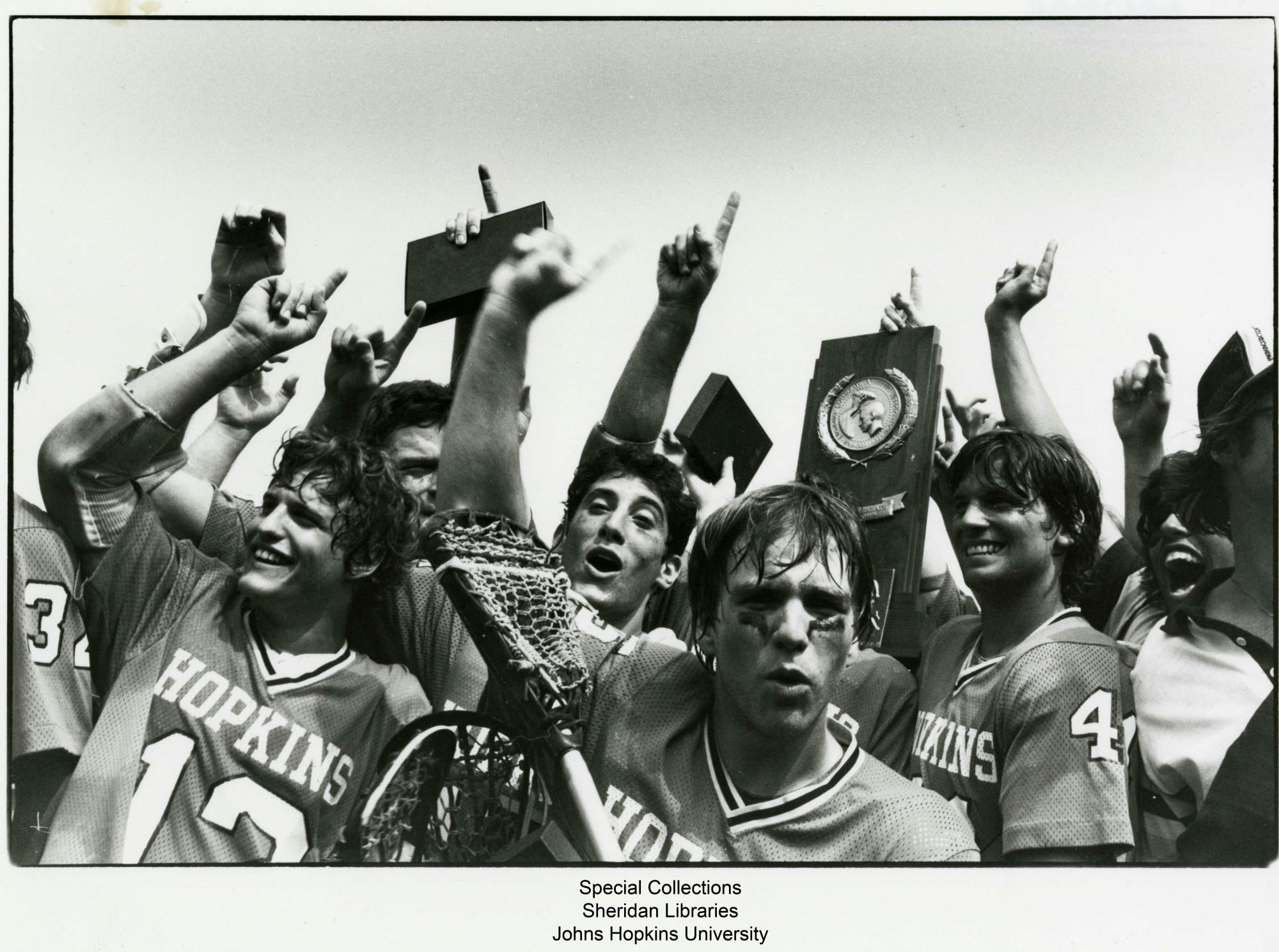 COURTESY OF THE JOHNS HOPKINS UNIVERSITY GRAPHIC AND PICTORIAL COLLECTION
Members of the lacrosse team celebrate after winning 1980 NCAA Championship, which occurred during Kruzansky's time with the sports section.