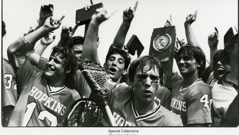 COURTESY OF THE JOHNS HOPKINS UNIVERSITY GRAPHIC AND PICTORIAL COLLECTION
Members of the lacrosse team celebrate after winning 1980 NCAA Championship, which occurred during Kruzansky's time with the sports section.