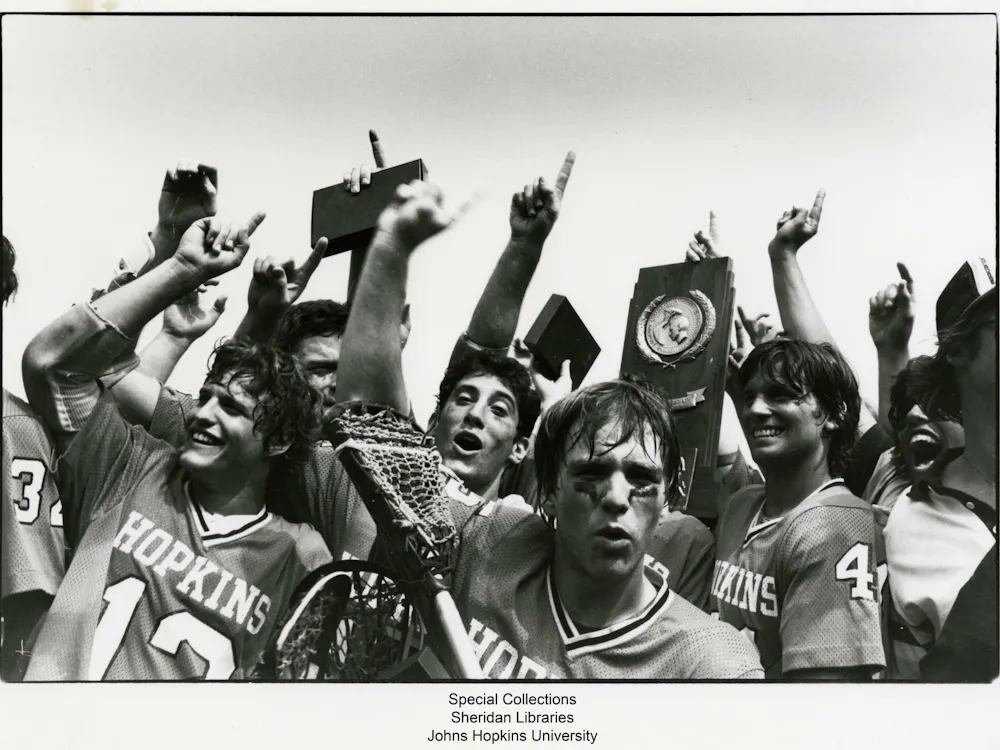 COURTESY OF THE JOHNS HOPKINS UNIVERSITY GRAPHIC AND PICTORIAL COLLECTION
Members of the lacrosse team celebrate after winning 1980 NCAA Championship, which occurred during Kruzansky's time with the sports section.