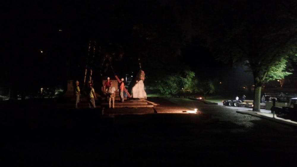 COURTESY OF JORDAN BRITTON
Crews hauled away the Lee-Jackson monument in the early hours of Wednesday morning. 