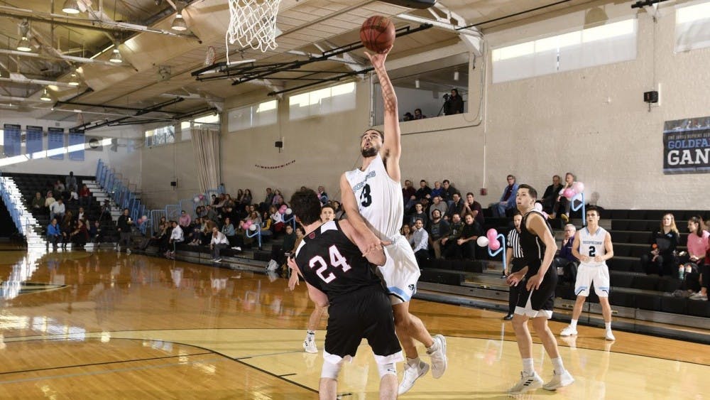 COURTESY OF HOPKINSSPORTS.COM

Senior forward Dan Vila finishes his career with a team-high 19 points against the Swarthmore College Garnet.