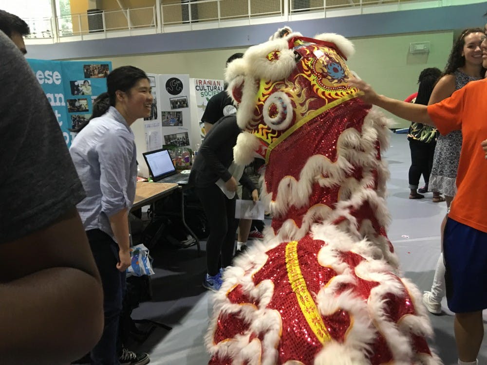 COURTESY OF JULIE CUI
Groups such as the Yong Han Lion Dance club reached out to interested students in every corner of the fair.