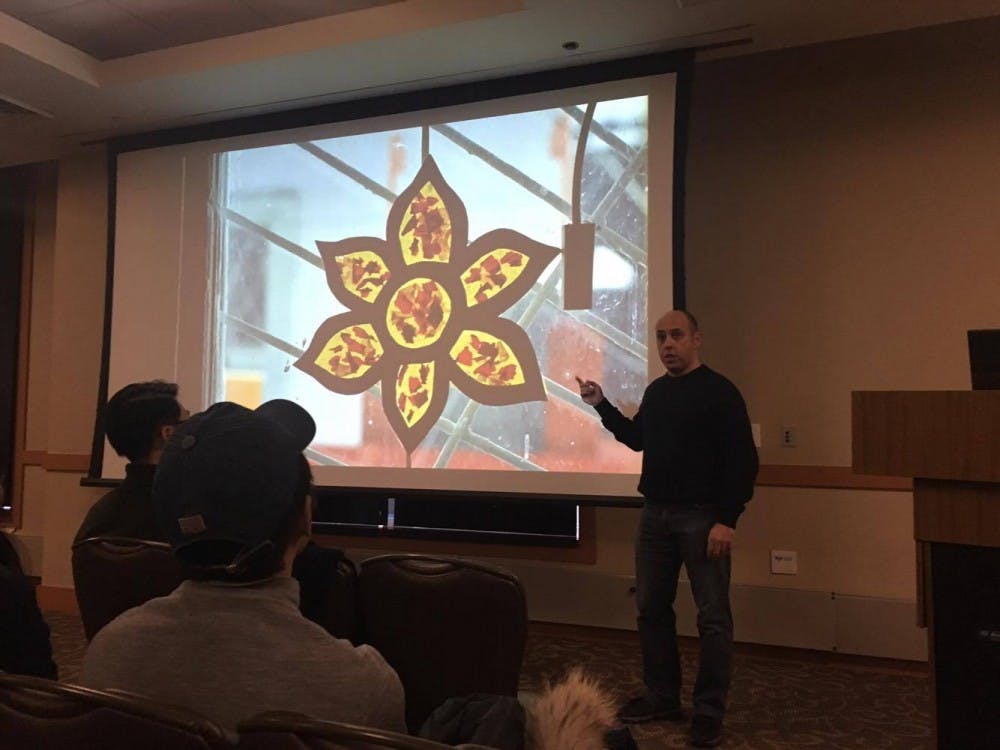 COURTESY OF SHERRY KIM
Kolotov explained the story and significance behind each of his photos.