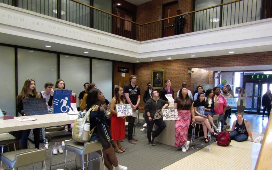 COURTESY OF ADVOCATES FOR DISABILITY AWARENESS
&nbsp;ADA members and other students staged a sit-in in Garland Hall to demand disability rights.&nbsp;