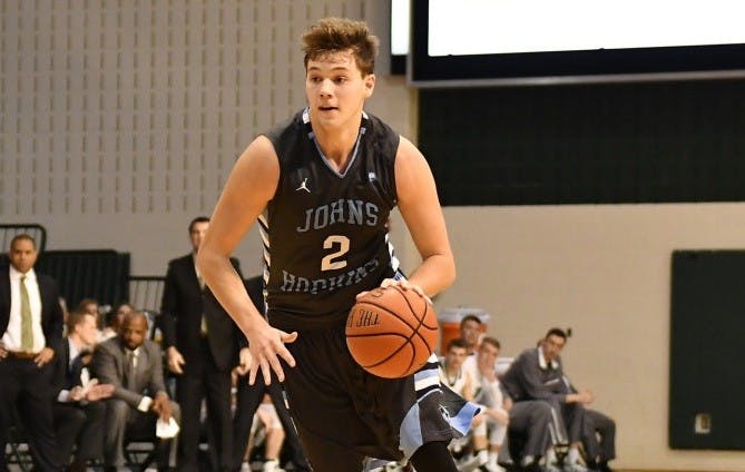 HOPKINSSPORTS.COM
Senior Ryan Curran led all scorers with 19 points on 7-13 shooting.