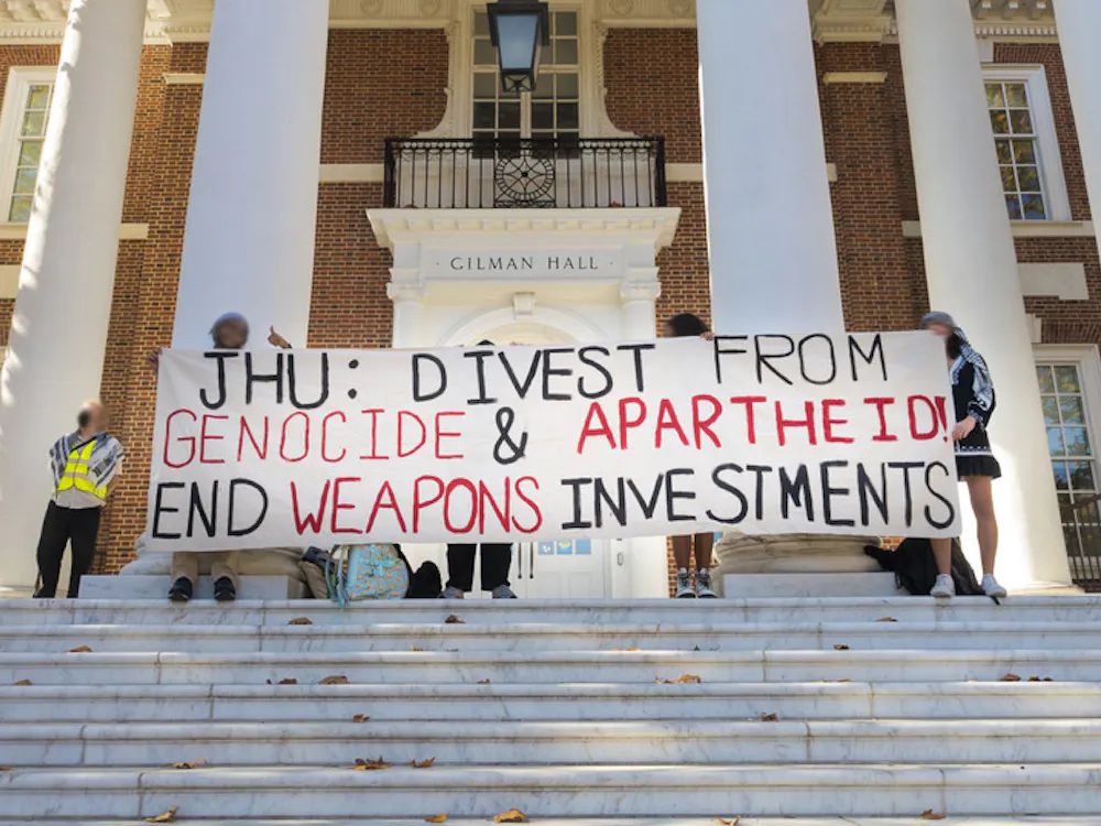 COURTESY OF ROWAN LIU
In a show of solidarity for the Palestine and pro-Palestine community members on campus, students and faculty gathered at a walkout in front of Gilman Hall.