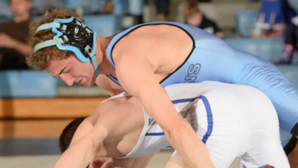 HOPKINSSPORTS.COM
Senior Evan Krumheuer performs a move against Saturday’s opponent.