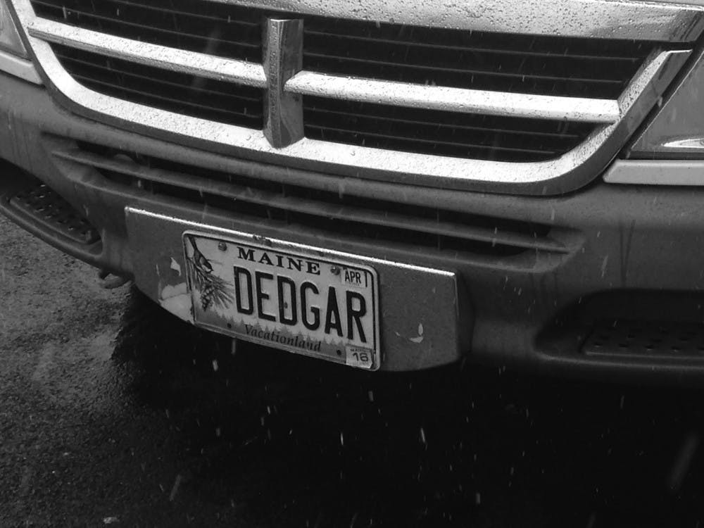 COURTESY OF RENEE SCAVONE
The Poemobile’s license plate