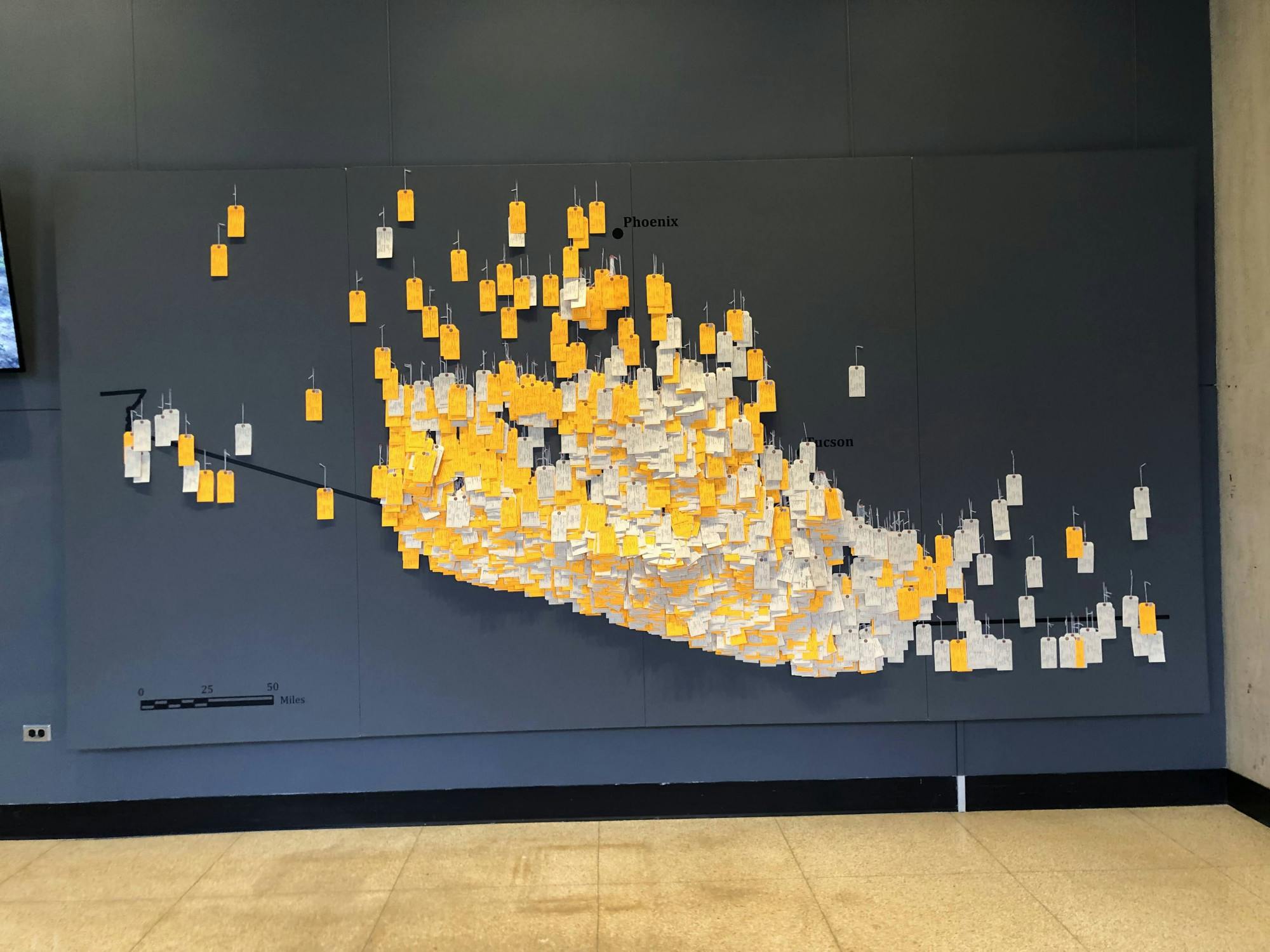 COURTESY OF MIN-SEO KIM
The Hostile Terrain 94 display uses toe tags to underline the human cost of America's immigration policies.&nbsp;