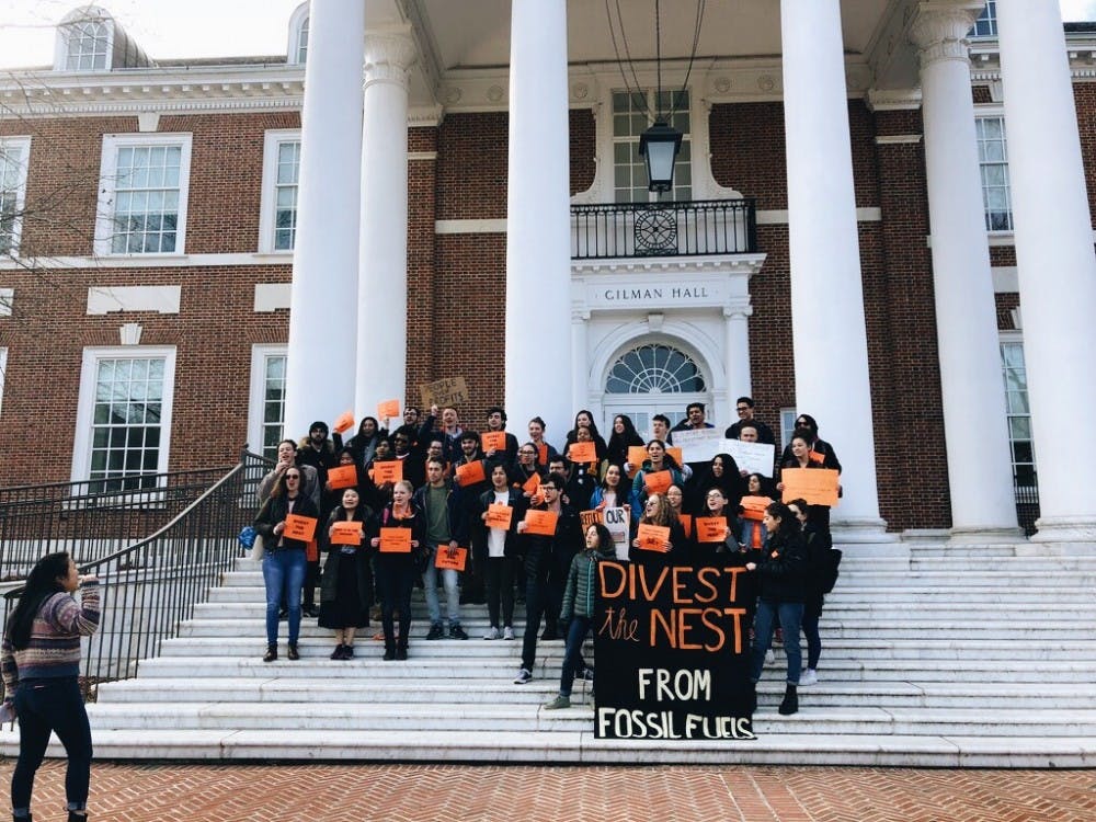 &nbsp;COURTESY OF SAM FOSSUM
Members of the student group Refuel our Future gathered on Tuesday to voice their dissatisfaction with the University’s partial divestment from fossil fuels.