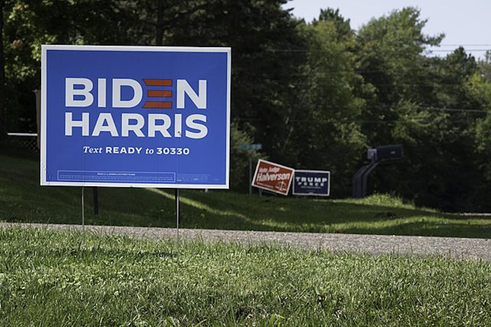640px-biden-harris-sign-with-trump-pence-sign-in-background-in-aitkin-minnesota-50501244931