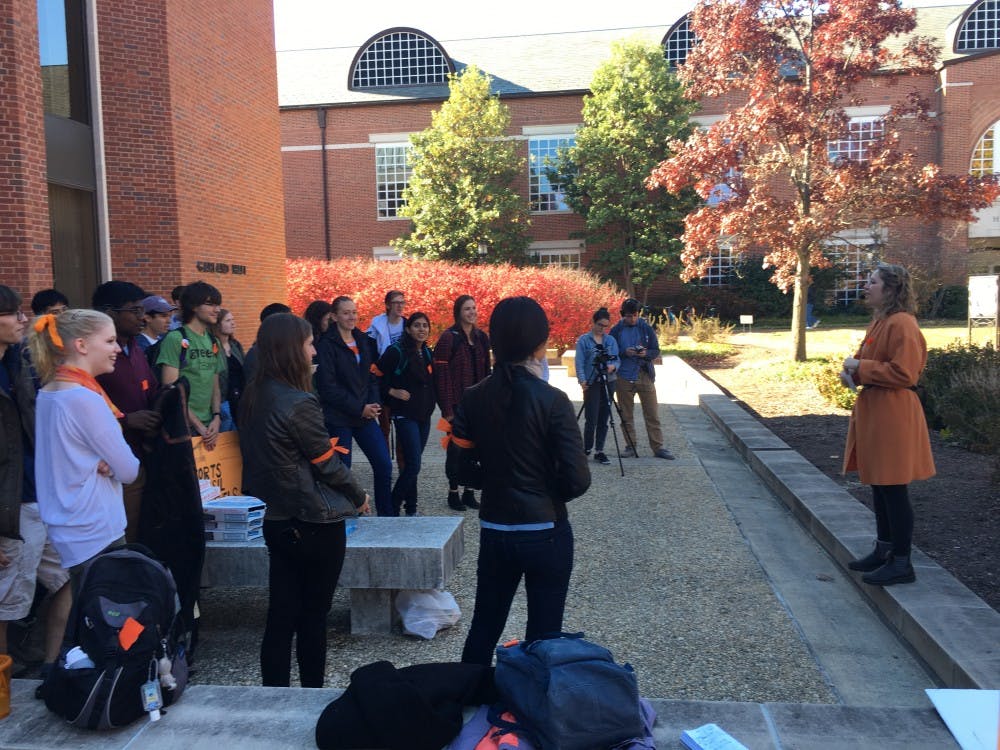 COURTESY OF ASHLEY KIM
President of Refuel Our Future Maggie Weese addressed the peaceful protestors outside of Garland Hall. 