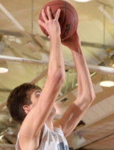 hopkinssports.com
Senior center Matt Billups had eight blocks to break the school record.