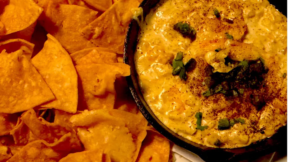 COURTESY OF DHARANI MOORTHY
The warm elotes dip was creamy, savory and ideal for sharing.