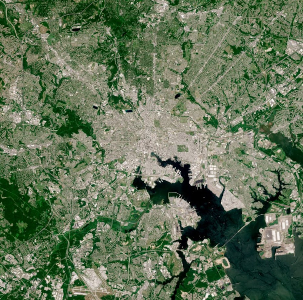 CC 3.0 &nbsp;CONTAINS MODIFIED CORPENICUS SENTINEL DATA 2020
This satellite image of Baltimore illustrates the lack of greenery in the city, making it susceptible to the urban heat island effect.
