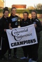 HOPKINSSPORTS.COM
The women’s soccer captains
celebrate their conference title.