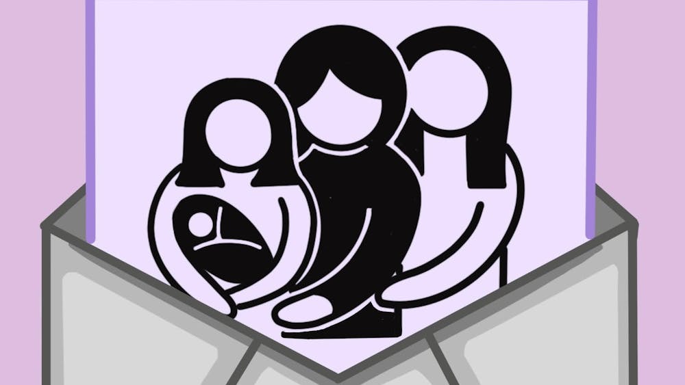 COURTESY OF SYDNOR DUFFY
Audrey Snowden pens her legacy letter with Hopkins student Omkar Katkade.