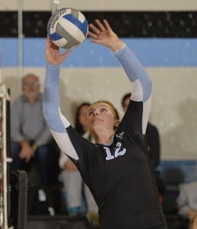  HOPKINSSPORTS.COM
Sophomore Kristi Rhead sets the ball in perfect form to her teammate, as the Jays go on to win.