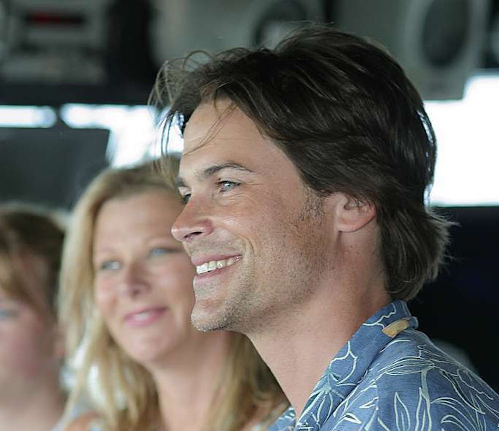 actor-rob-lowe-and-wife-sheryl-berkoff-smile-as-cmdr-w-a-kearns-commanding-3345f6