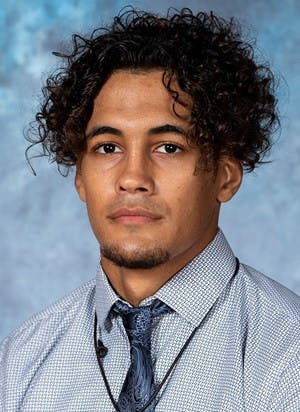 COURTESY OF HOPKINSSPORTS.COM
Senior Dominick Reyes won his second consecutive NCAA regional title last weekend.