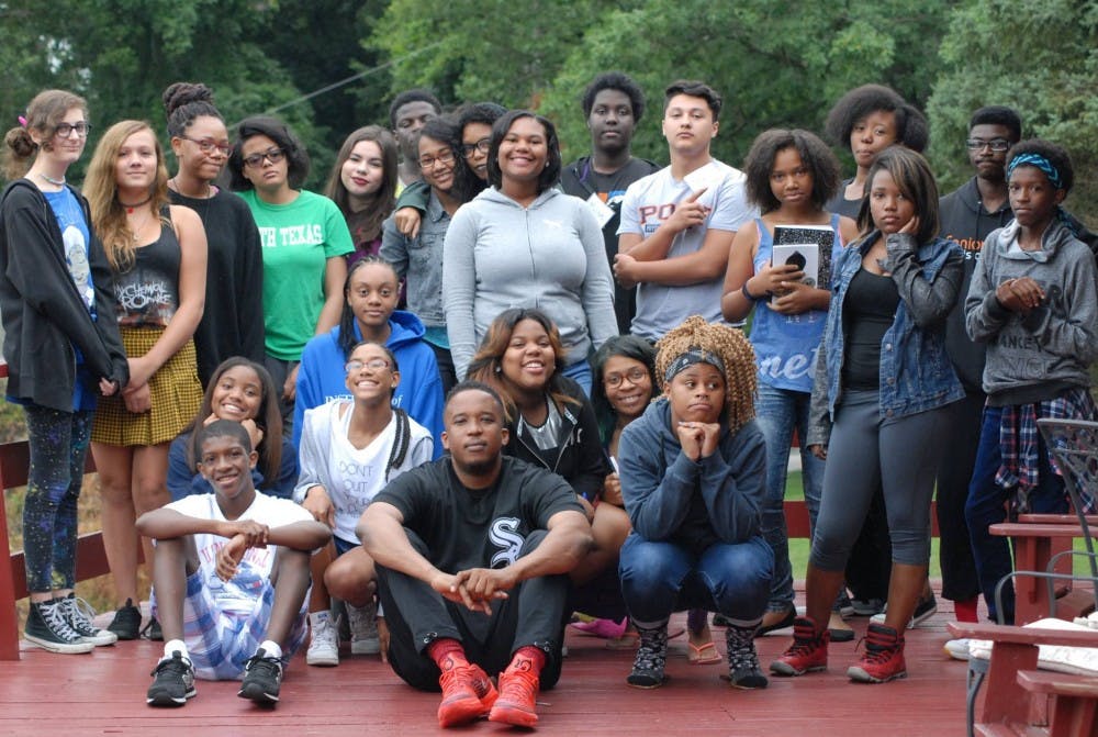 COURTESY OF NANCY JAGELKA
Students have the opportunity to learn from undergraduates, professors and local writers, like Baltimore author D. Watkins (center). 