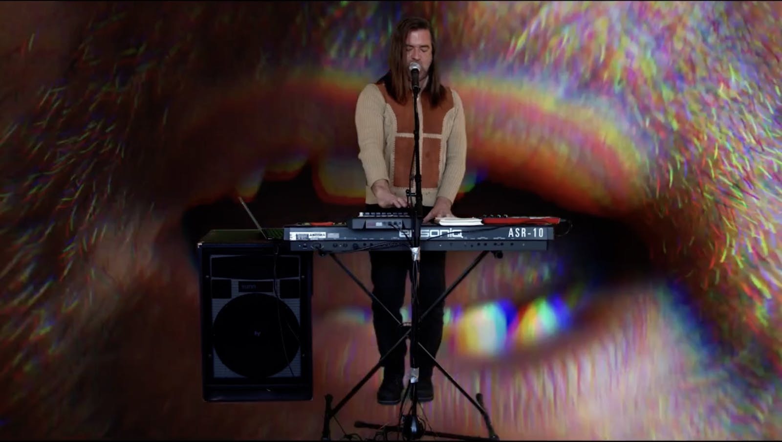 COURTESY OF JAE CHOI
Clint McCallum's background during his performance at The Red Room in Your Room concert.