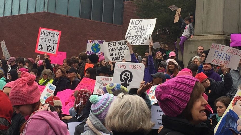 COURTESY OF GILLIAN LELCHUK Protesters gathered with signs at Baltimore’s Women’s March.