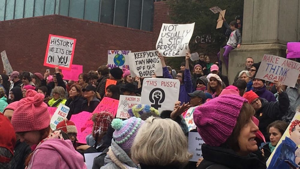  COURTESY OF GILLIAN LELCHUK Protesters gathered with signs at Baltimore’s Women’s March.