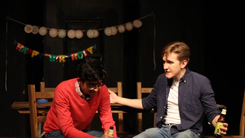 COURTESY OF JOHNS HOPKINS UNIVERSITY BARNSTORMERS
Usman Enam (left) and Carver Bain (right) starred respectively in the play as Dev and Conrad.