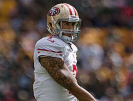 MIKE MORBECK/ CC BY-SA 2.0
Colin Kaepernick provoked controversy by kneeling during the national anthem.