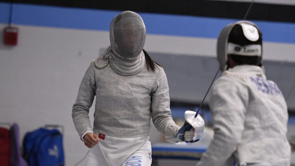 HOPKINSSPORTS.COM
Sophomore Erin Chen defended her individual title in the Sabre competition.