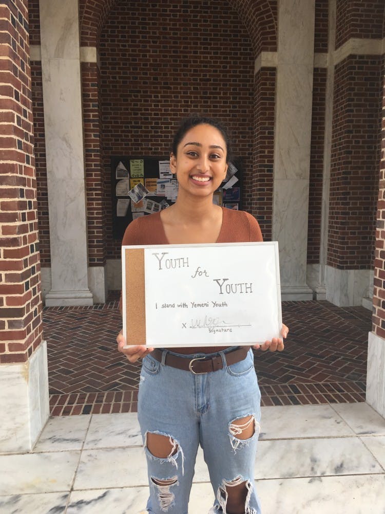 Students gathered on the Breezeway to educate others about the war in Yemen.