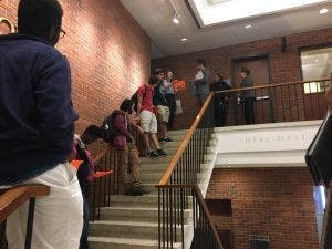  COURTESY OF SHERRY KIM
Demonstrators spoke with Vice Provost Shollenberger upon entering Garland Hall.