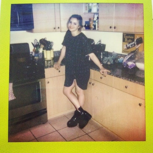  COURTESY OF MIA CAPOBIANCO
The gorgeous Kate Buchser in her apartment before a night out. 