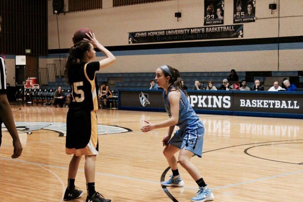 hopkinssports.com
Junior Caroline Corcoran poured in 11 points in the big victory.