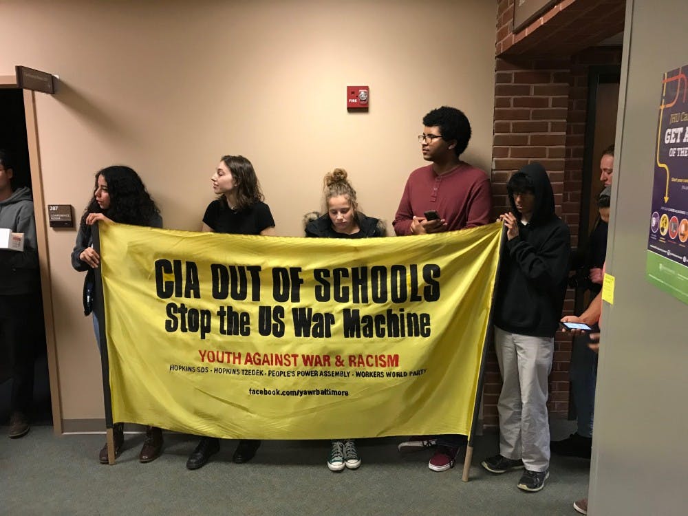 COURTESY OF JACOB TOOK

Students protestors stood and chanted in front of the Career Center.