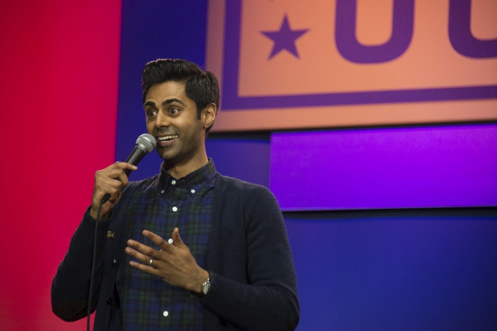 U.S. Air Force photo/Staff Sgt. Kat Justen 
Hasan Minhaj adapts his usual stand-up persona for a weekly Netflix show.
